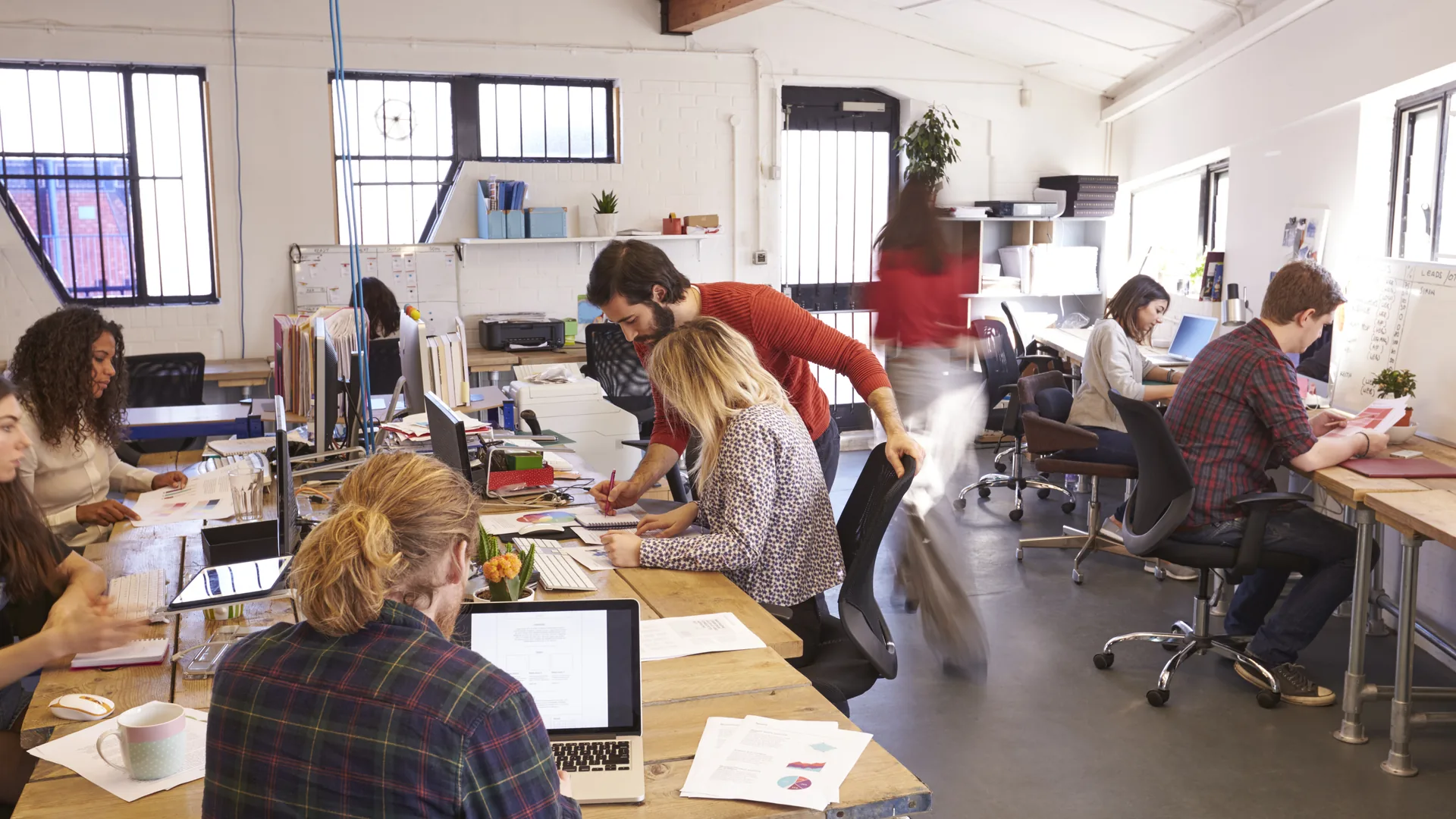 Interior Of Busy Design Office With Staff
